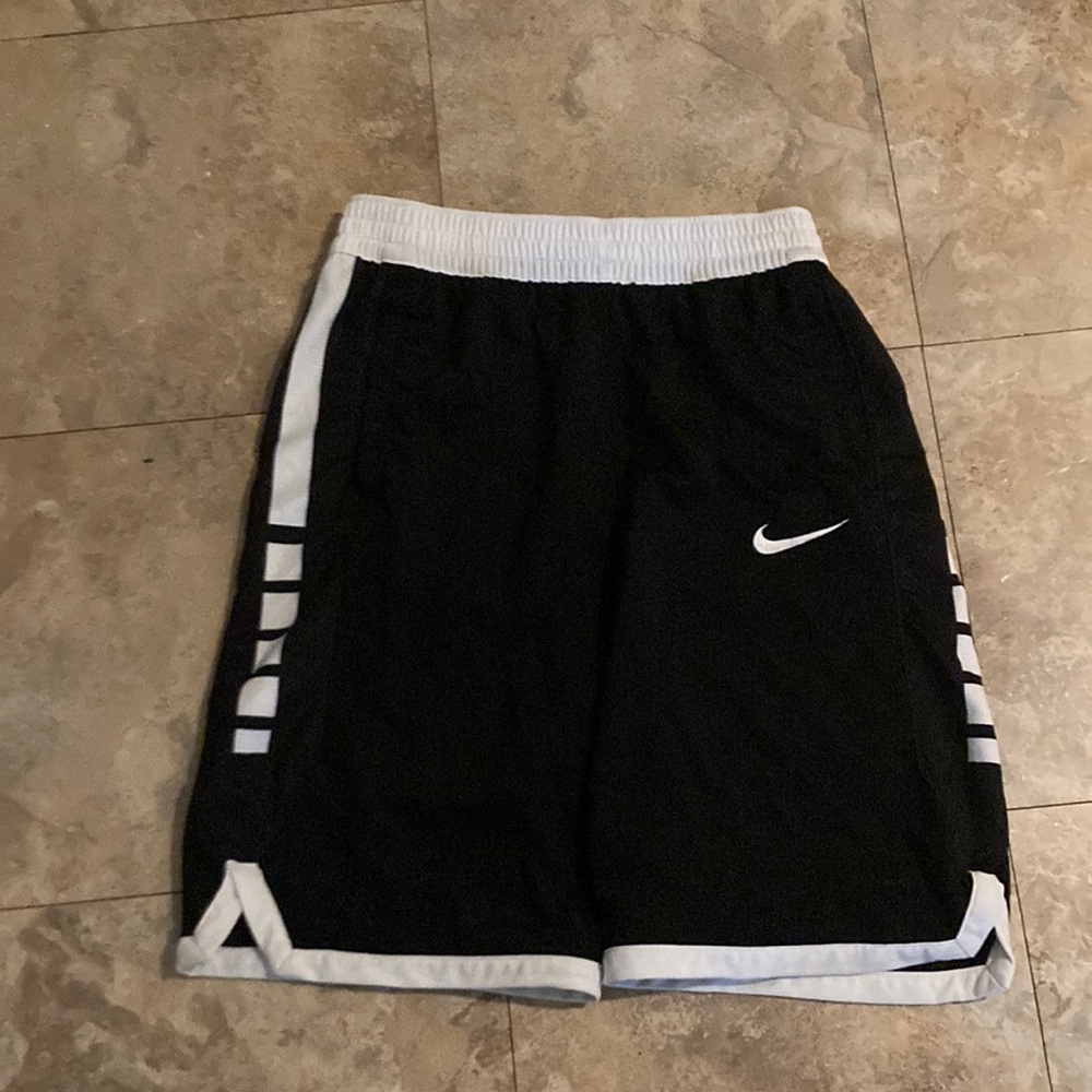 it is a junior nike basketball shorts with a waist band